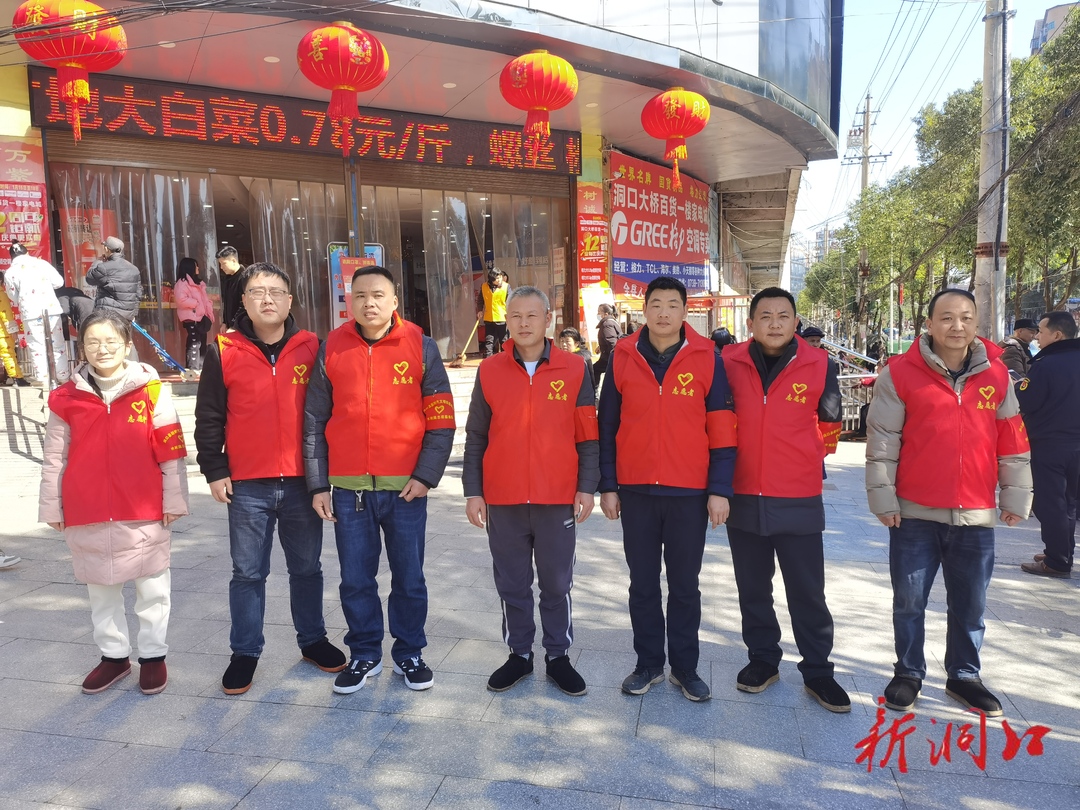 洞口县水利局开展文明交通劝导志愿服务活动