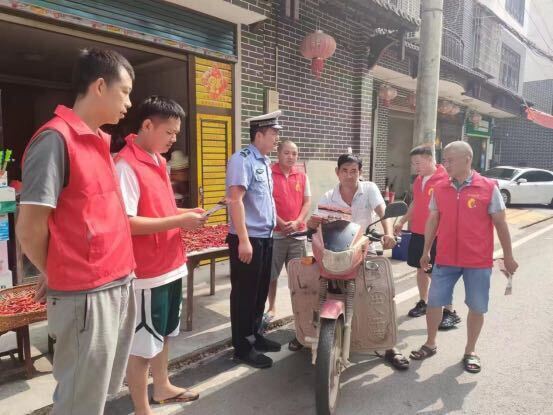洞口县古楼乡：开展交通安全劝导 助力优化营商环境